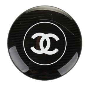 Black carbon fiber Chanel frisbee disk. New with box